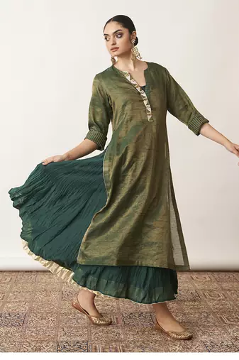 The bottle green silk tissue chanderi kalidaar ensemble