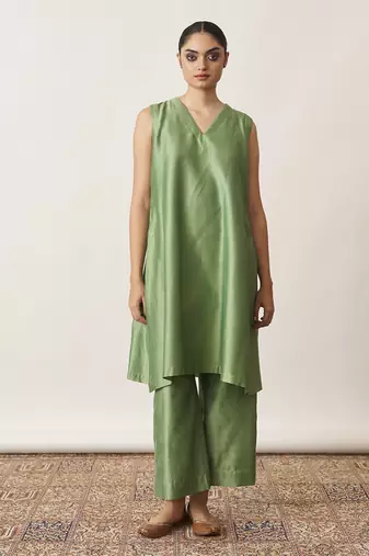 The pista green silk chanderi ensemble