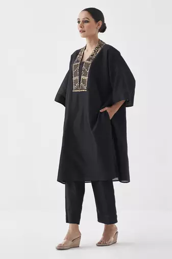 The surmayee silk chanderi ensemble with woven banarasi & handwork