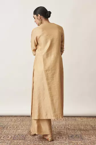 The gold beige silk tissue chanderi kurta & pants set