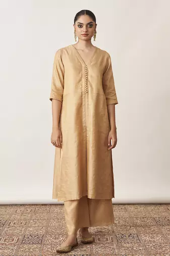 The gold beige silk tissue chanderi kurta & pants set