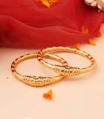 Gold Bangles with Intricate Gold Detailing