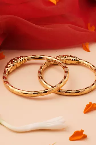 Gold Bangles with Intricate Gold Detailing