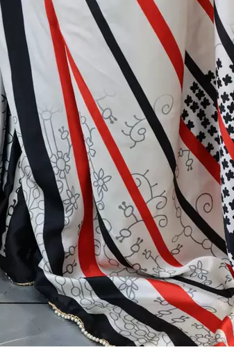Red printed satin pearl lace saree with  unstitched blouse