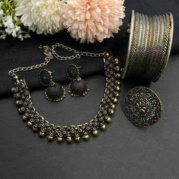 Dual tone silver and gold plated oxidized jewelry set of choker necklace, jhumka earrings, ring & cuff bangle 1