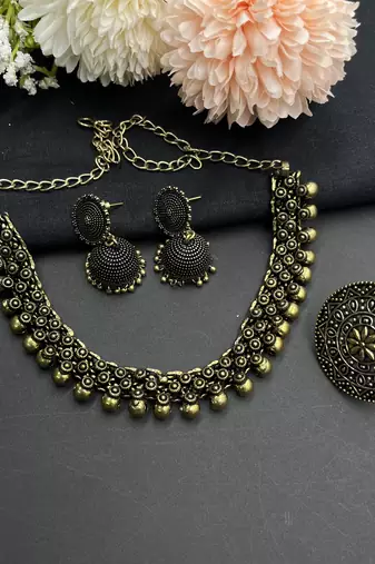 Dual tone silver and gold plated oxidized jewelry set of choker necklace, jhumka earrings, ring & cuff bangle