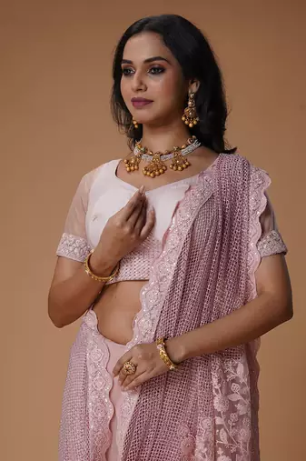 Baby pink stone work net saree