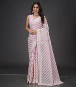 Regal purple organza saree with intricate thread work and stone