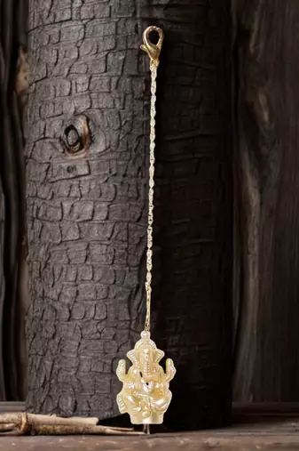 Sunehri roshni watch charm
