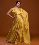 Yellow bandhani saree with belt