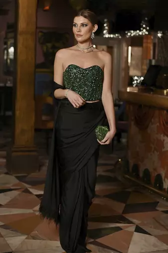Black pre-drape saree with embellished corset
