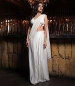 Cream pre draped saree with embellished blouse