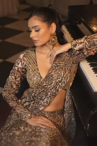 Printed ruffle saree with hand embellished blouse
