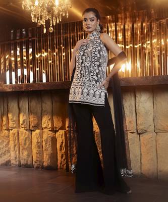 Black and white thread work kurta with flared trousers 2