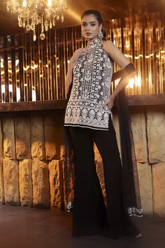 Black and white thread work kurta with flared trousers