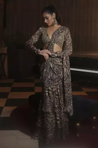 Printed ruffle saree with hand embellished blouse