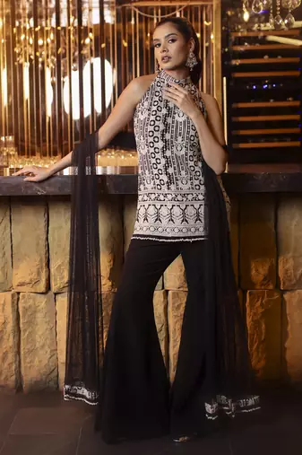 Black and white thread work kurta with flared trousers
