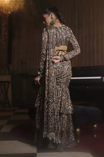 Printed ruffle saree with hand embellished blouse