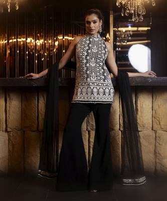 Black and white thread work kurta with flared trousers 5