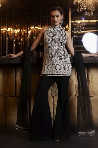Black and white thread work kurta with flared trousers