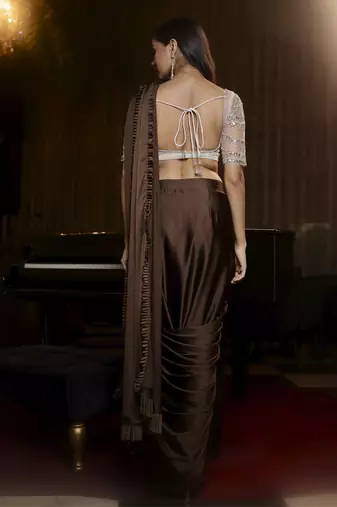 Chocolate brown satin pre draped saree with silver hand embellished kundan work blouse