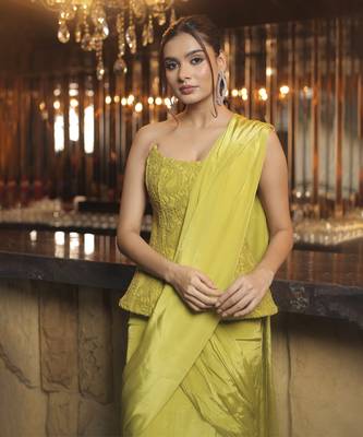 Parrot green pre draped saree with corset blouse in chantley net. 2