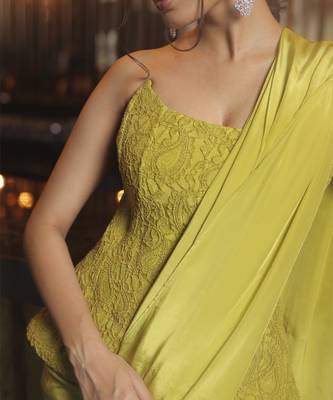 Parrot green pre draped saree with corset blouse in chantley net. 3