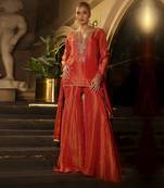 Orange bandhani tissue kurta with sharara and dupatta