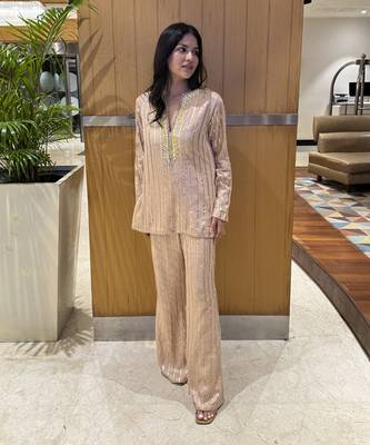 Peach embellished kurta with flared pants 1