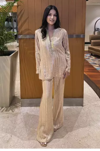 Peach embellished kurta with flared pants