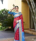 Red trendy crepe saree with woven zari patta and designer print work