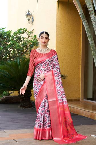 White trendy crepe saree with woven zari patta and designer print work