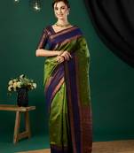Green banarasi silk blend wevon jari designer heavy looks glamorous ceremonial saree