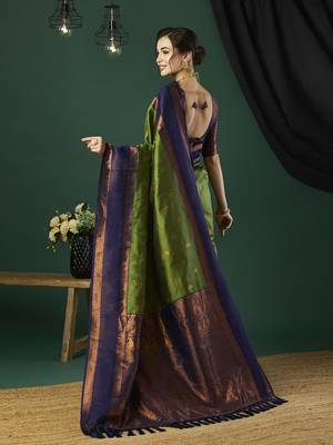 Green faux banarasi silk blend wevon zari heavy looks glamorous ceremonial saree 2