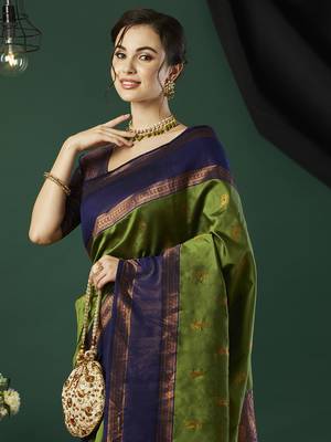 Green faux banarasi silk blend wevon zari heavy looks glamorous ceremonial saree 3