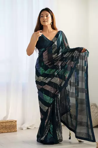 Teal blue glamorous georgette c sequins work looks saree