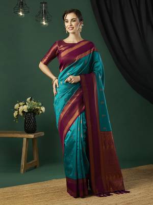Aqua blue faux banarasi silk blend wevon zari heavy looks glamorous ceremonial saree 1