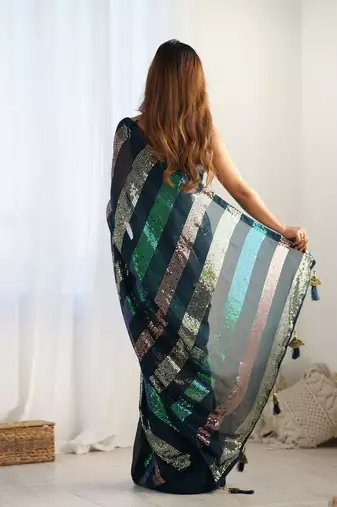 Teal blue glamorous georgette c sequins work looks saree