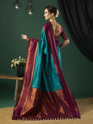 Aqua blue faux banarasi silk blend wevon zari heavy looks glamorous ceremonial saree 2