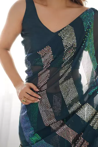 Teal blue glamorous georgette c sequins work looks saree
