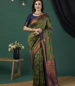 Green ethnic banarasi silk blend saree with floral woven designer looks