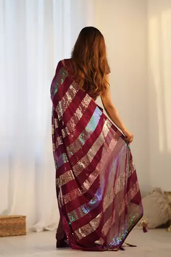 Maroon glamorous georgette c sequins work looks saree