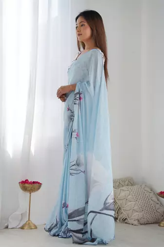 Sky blue chinon c digital printed saree with mirror cut work