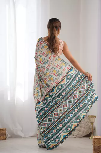 Off white chinon c digital printed saree with mirror cut work