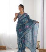 Green chinon c digital printed saree with mirror cut work