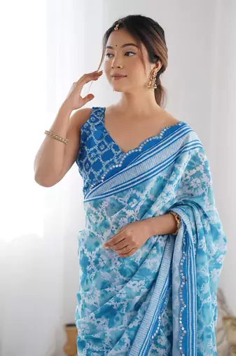 Blue chinon c digital printed saree with mirror cut work