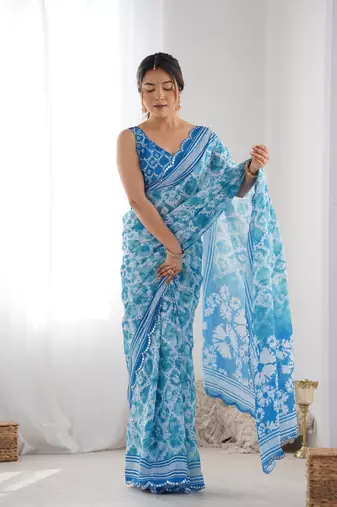Blue chinon c digital printed saree with mirror cut work