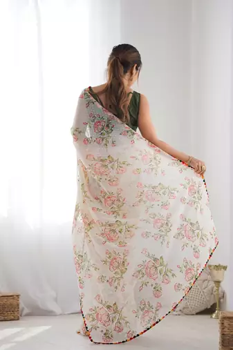 Off white georgette c graceful ethnic partywear saree