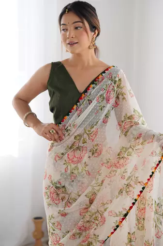 Off white georgette c graceful ethnic partywear saree
