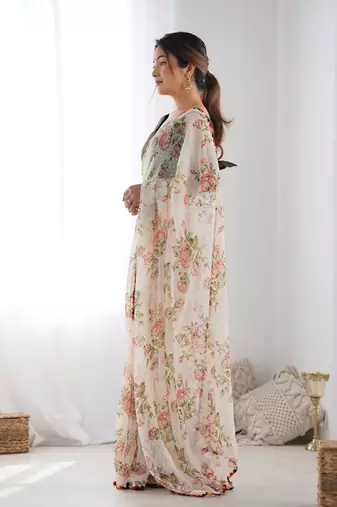 Off white georgette c graceful ethnic partywear saree